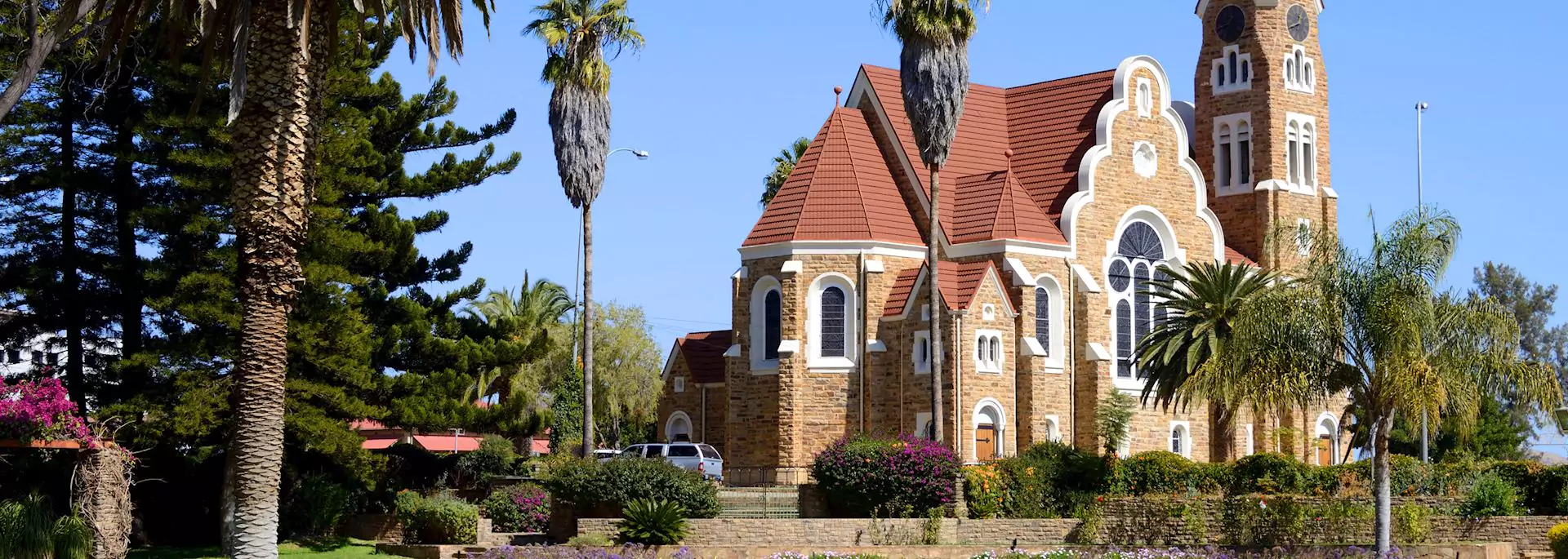 Rear view of the Christuskirche building in Windhoek, highlighting its Gothic Revival spire.